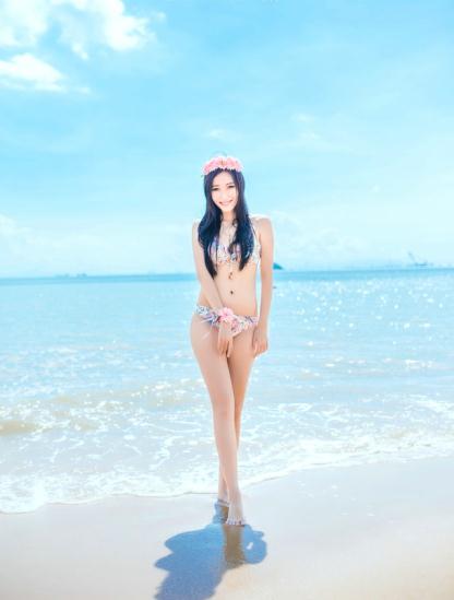 沙滩上笑容十分甜美的如花美女【12P】